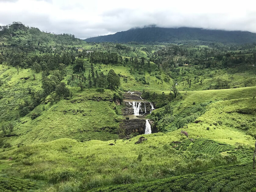 Beautiful waterfalls seen from Nuwara Eliya tea plantations, one of 6 most beautiful tea estates in the world.